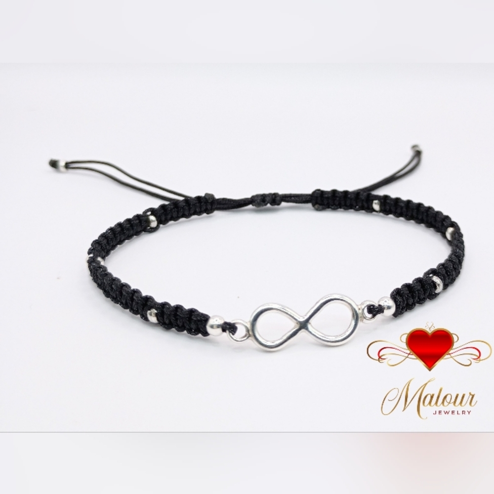 950 SILVER BRACELET IN BLACK THREAD WITH INFINITY SYMBOL.
